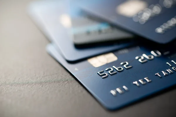 credit-cards-stacked-on-gray-table-finance-concep-2026-01-07-07-30-03-utc