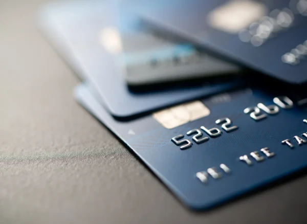 credit-cards-stacked-on-gray-table-finance-concep-2026-01-07-07-30-03-utc