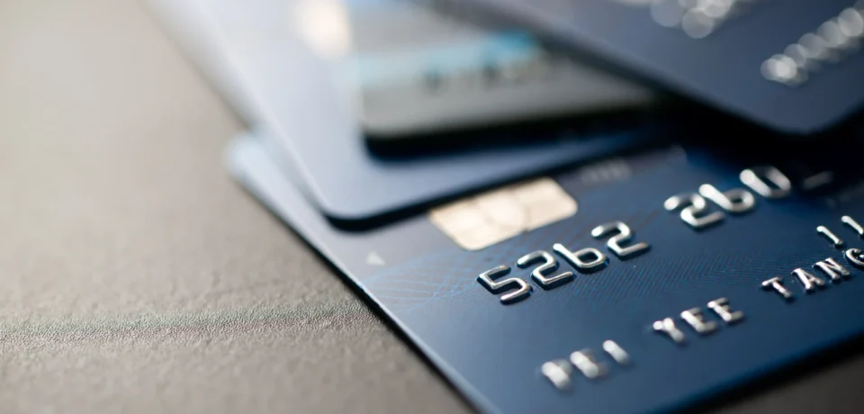 credit-cards-stacked-on-gray-table-finance-concep-2026-01-07-07-30-03-utc